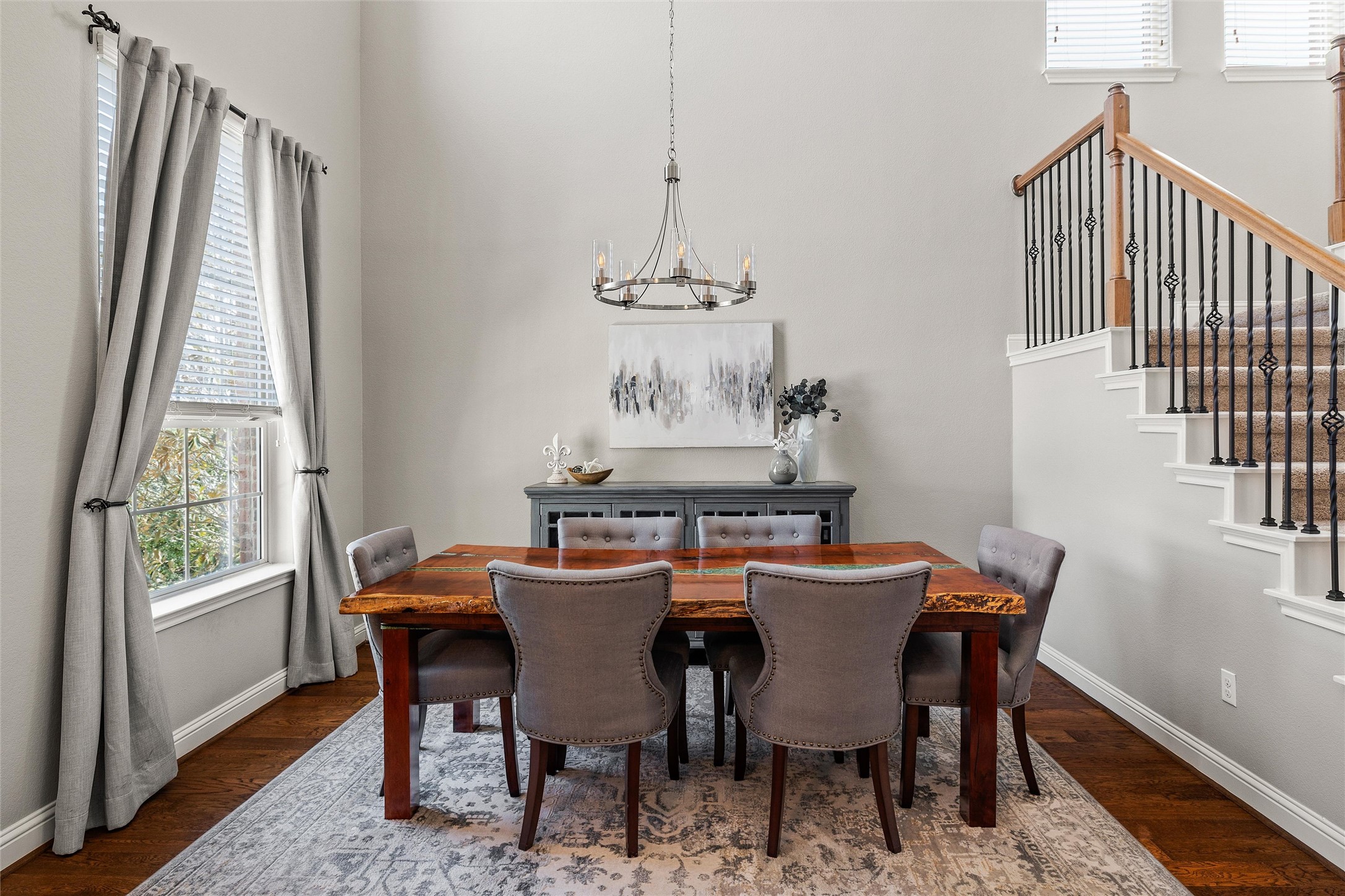 151 Swallowtail Drive Austin, TX 78737 - Photo 4 of 40 a view of a dining room with furniture window and wooden floor