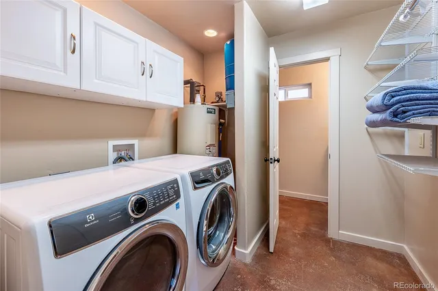 a bathroom with a tub and sink