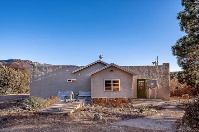 a view of yard with patio