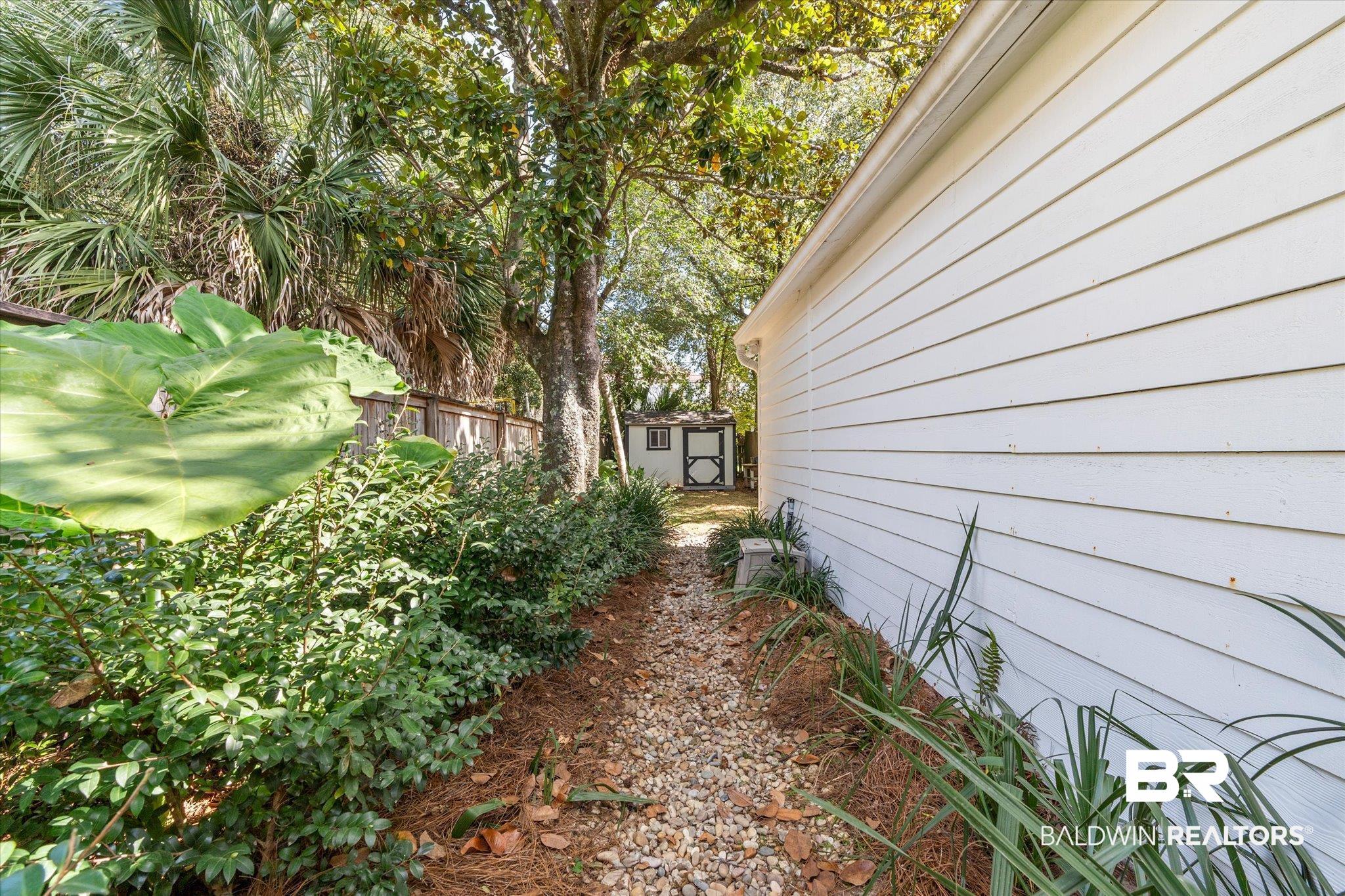 202 Woodlands Avenue Mobile, AL 36607 - Photo 38 of 53 View of home's exterior with a storage shed