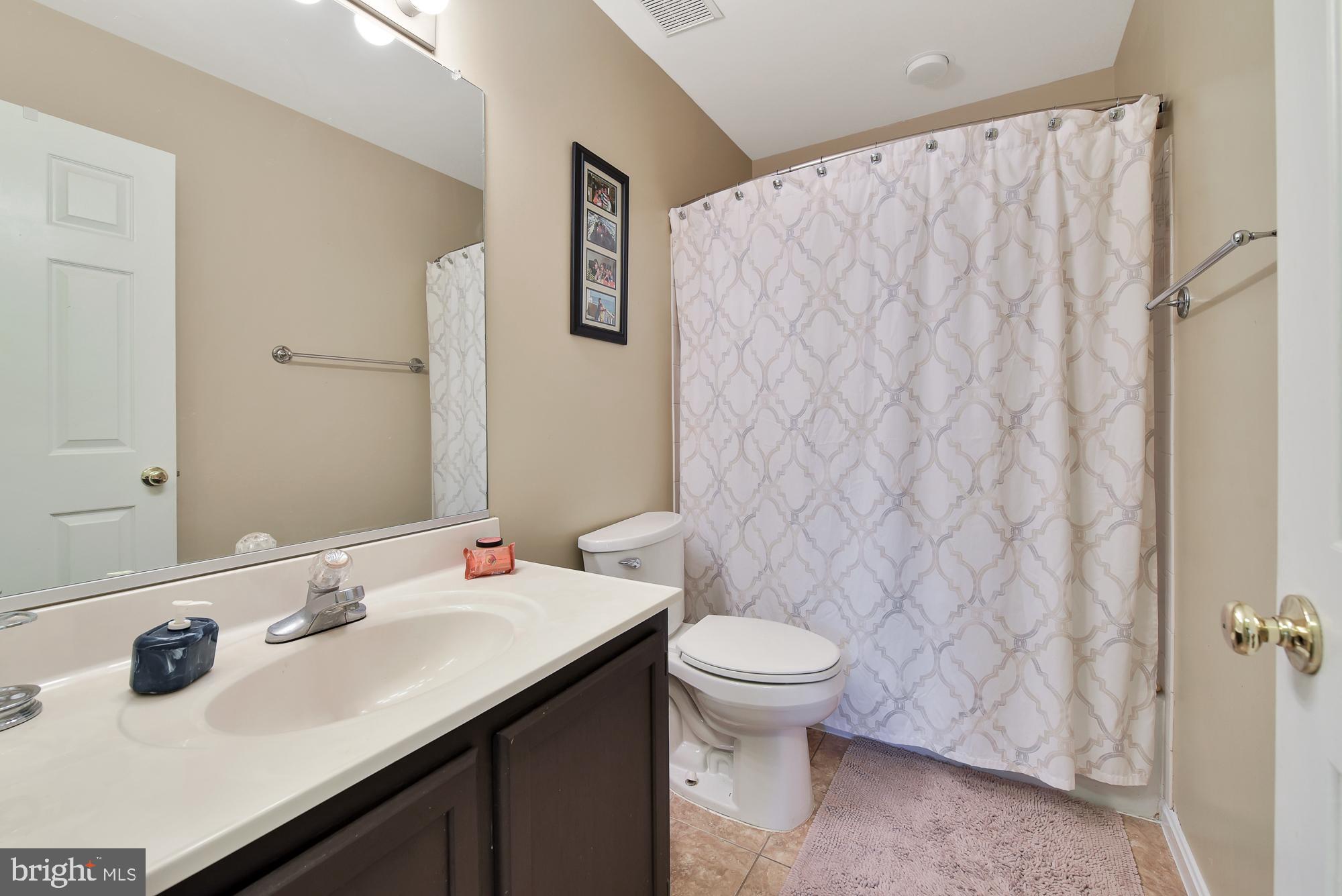 19954 Spurrier Avenue Poolesville, MD 20837 - Photo 41 of 54 Upgraded hall bath