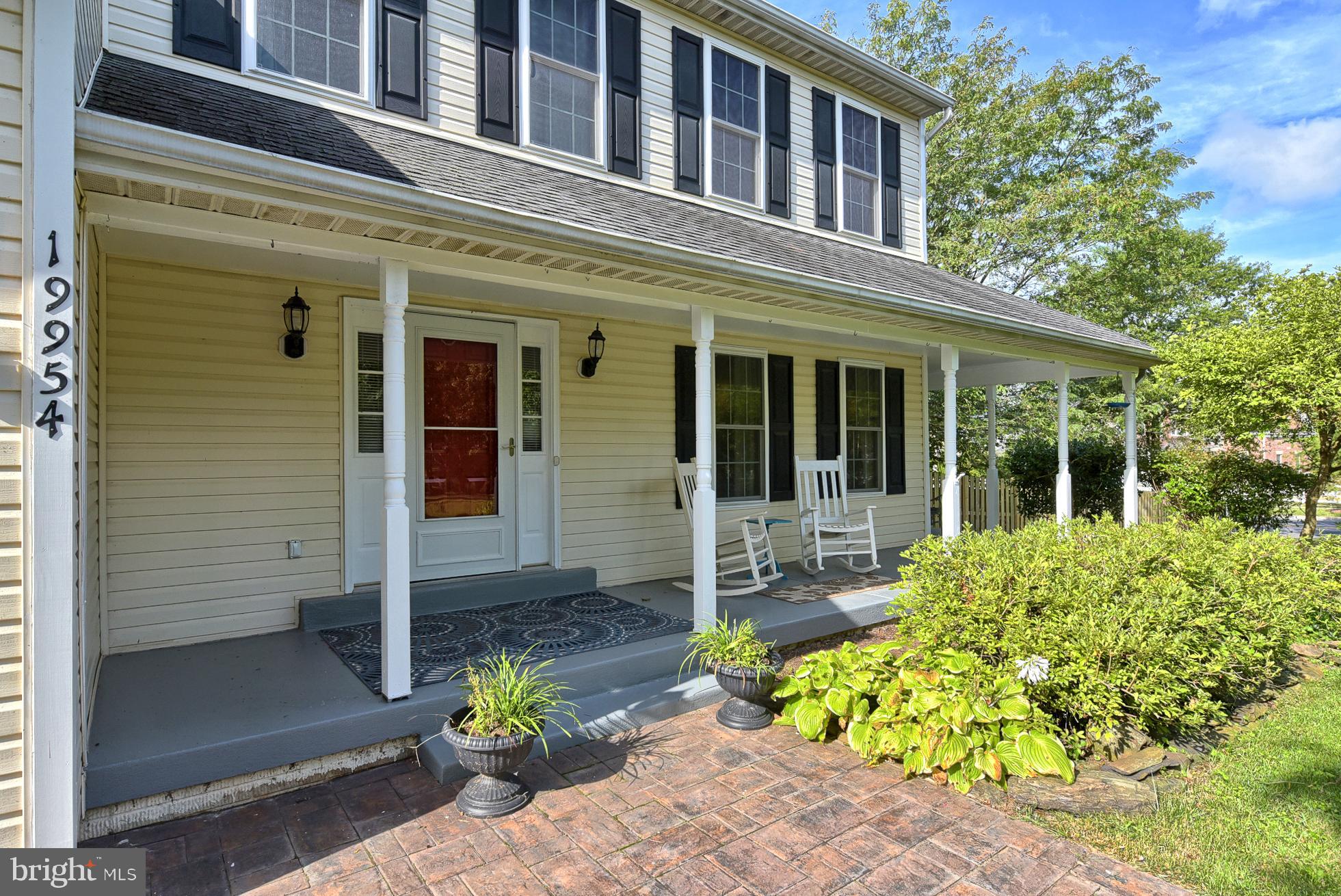 19954 Spurrier Avenue Poolesville, MD 20837 - Photo 6 of 54 Rocking chairs are a must for this front porch!