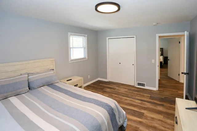 a bathroom with a sink vanity and mirror