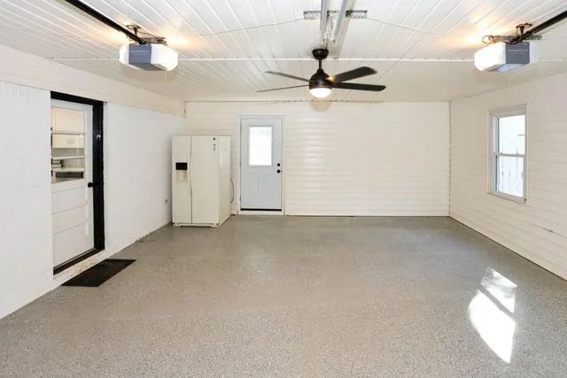 en empty room with windows