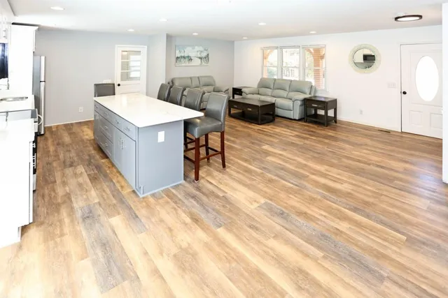 a living room with furniture and a table