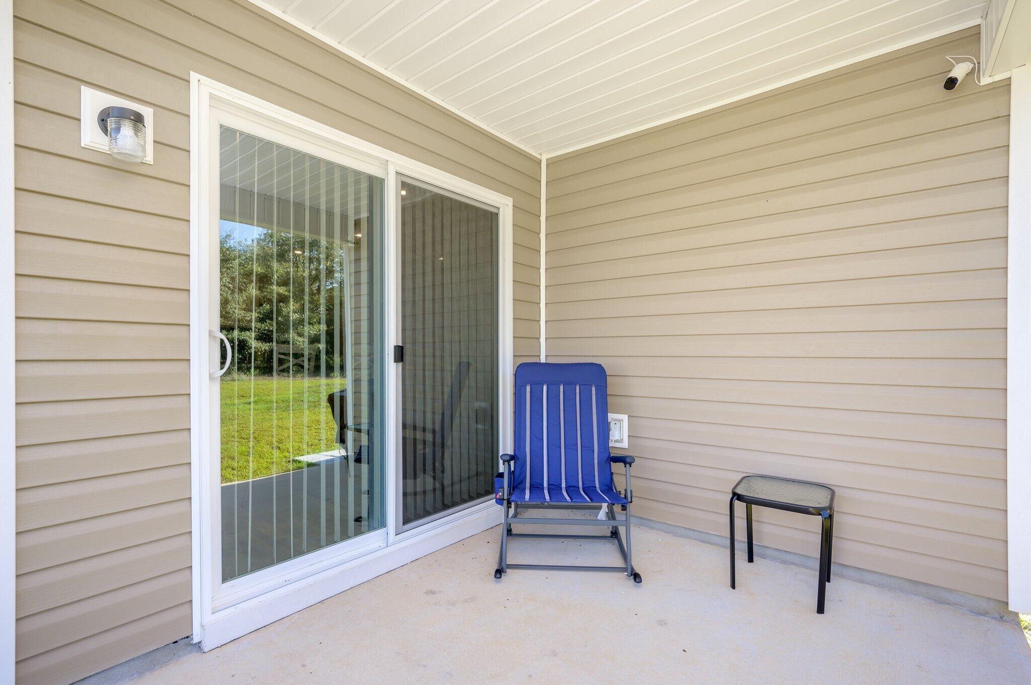 42 Lockwood Way East DeFuniak Springs, FL 32435 - Photo 28 of 38 a view of two chairs with a table in balcony
