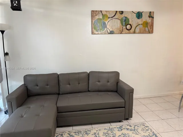 a living room with a couch