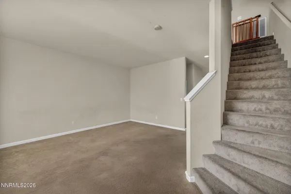 a view of an entryway with stairs