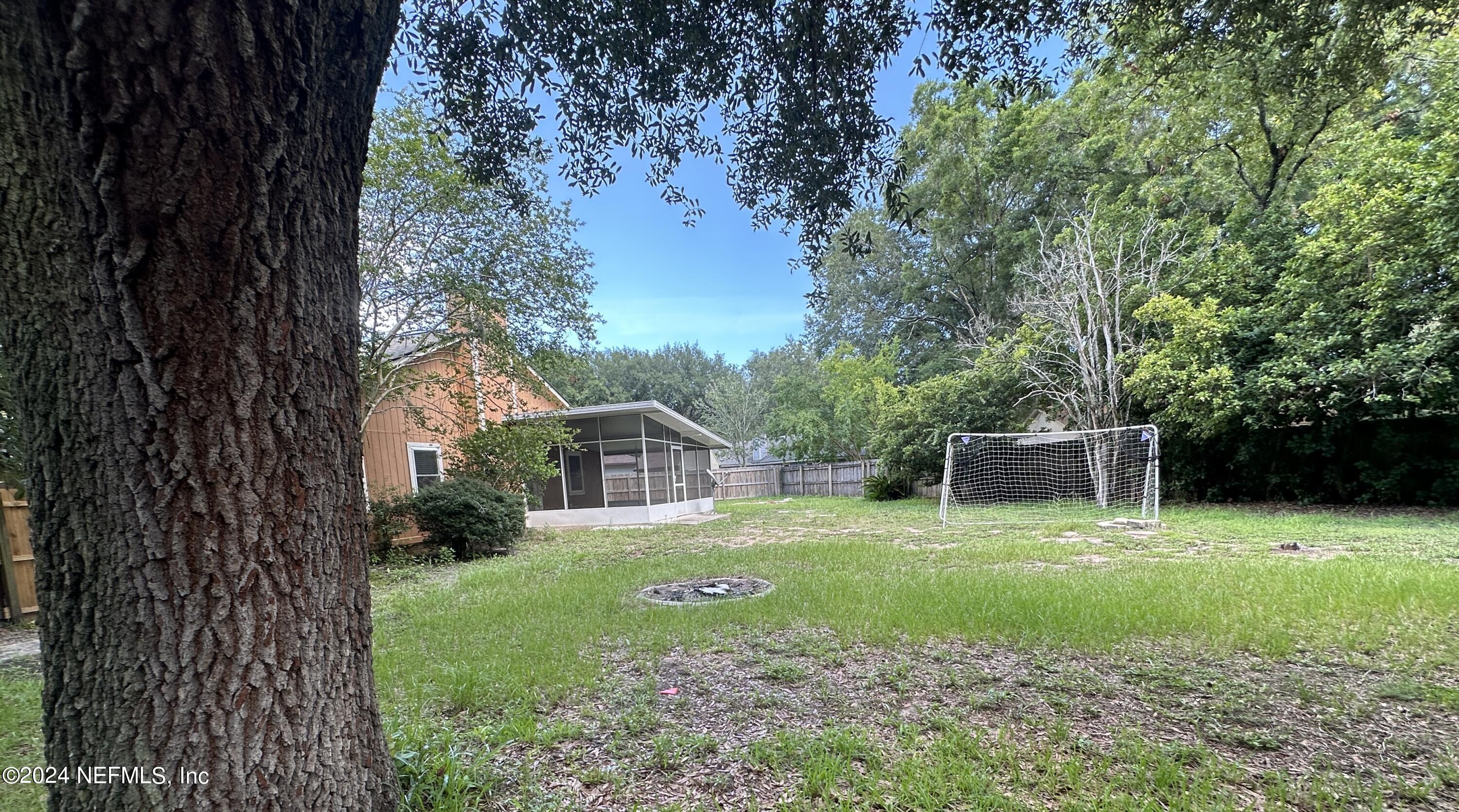 1540 Panther Ridge Court Jacksonville, FL 32225 - Photo 22 of 24 Back Left oak