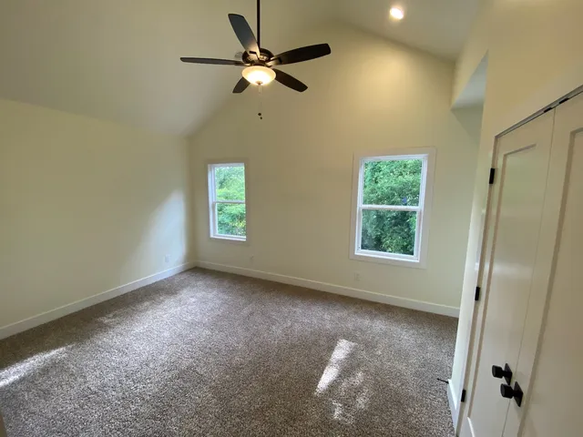 a view of an empty walk in closet