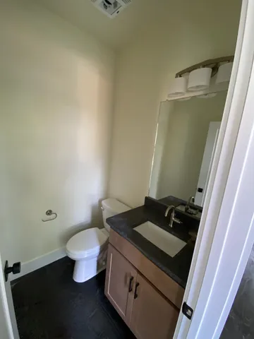 a bathroom with a sink and a toilet