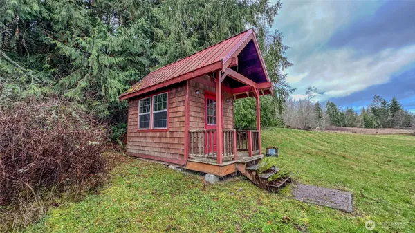 a view of a yard with an outdoor space