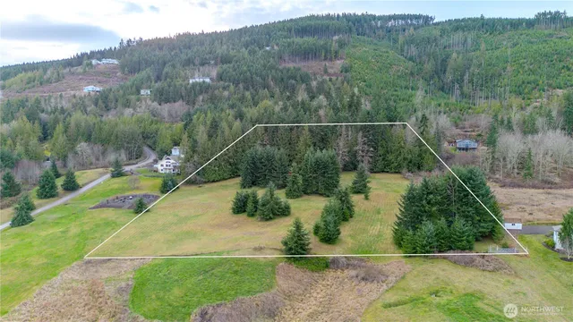 a view of a house with a park