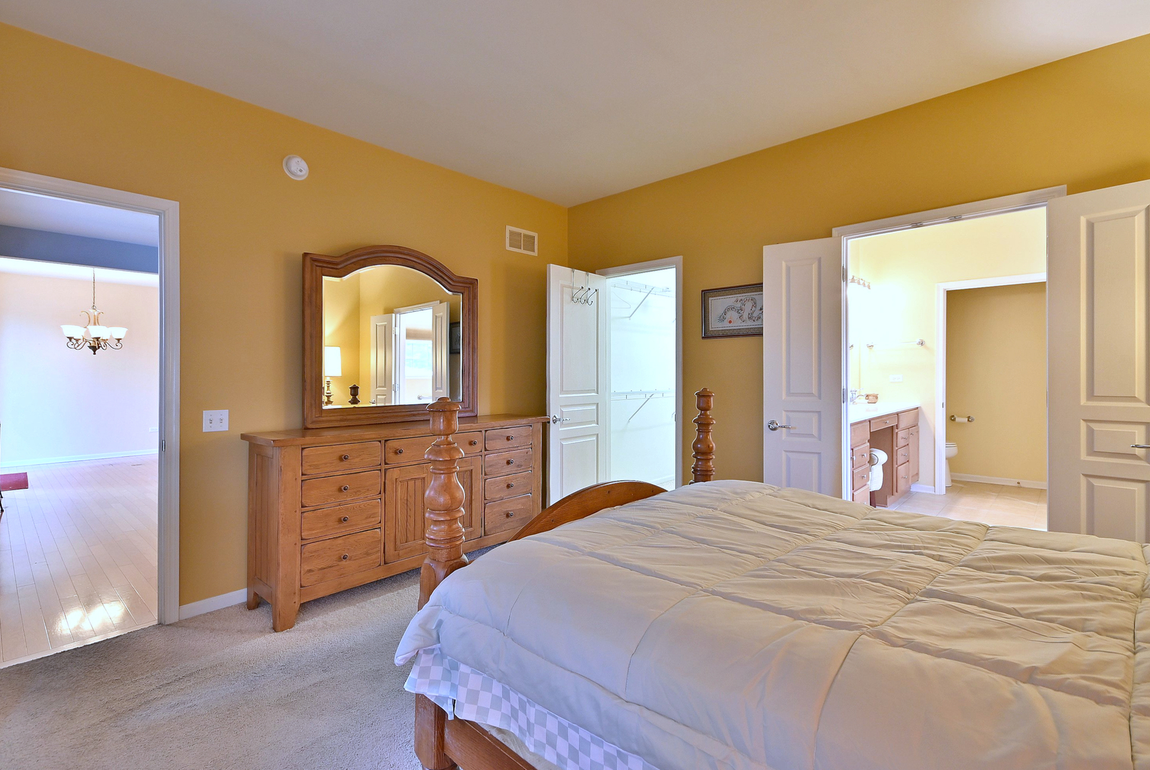 2832 Beacon Point Circle Elgin, IL 60124 - Photo 22 of 36 a bedroom with a bed and a dresser