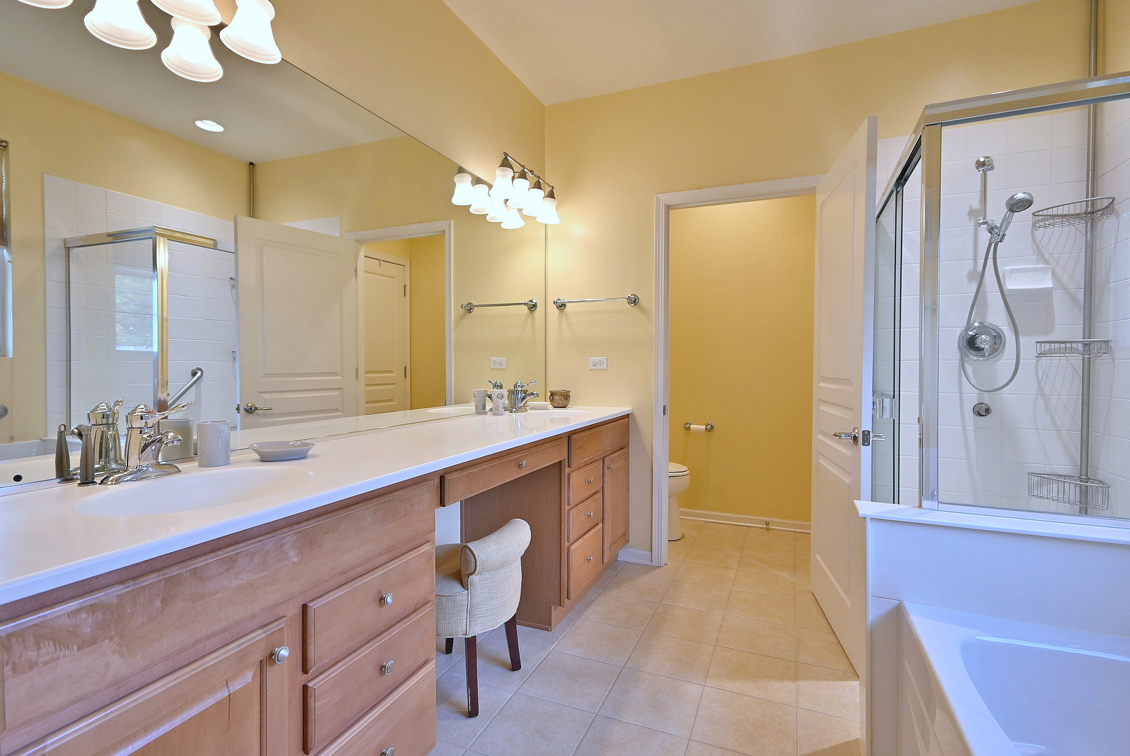 2832 Beacon Point Circle Elgin, IL 60124 - Photo 25 of 36 a spacious bathroom with a double vanity sink mirror double and shower