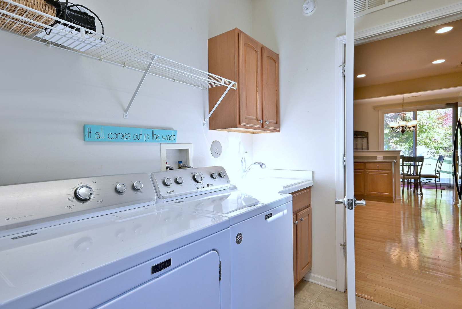 2832 Beacon Point Circle Elgin, IL 60124 - Photo 35 of 36 a bathroom with a sink and a mirror