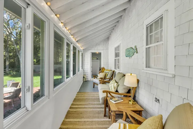 a outdoor space with patio the couches and a dining table with balcony view