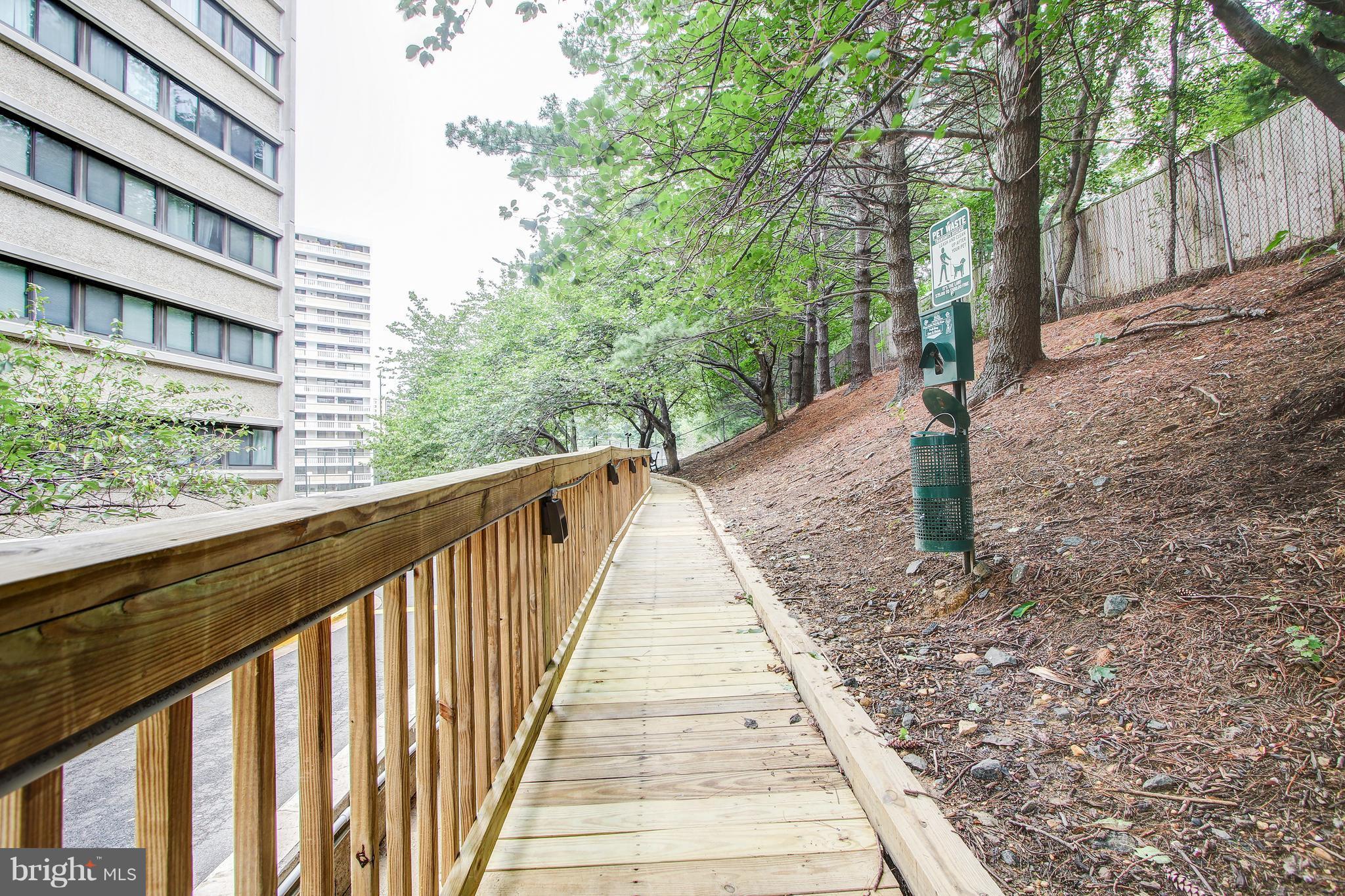 5911 Edsall Road, Unit 902 Alexandria, VA 22304 - Photo 26 of 26 a view of a pathway of a house with a fountain