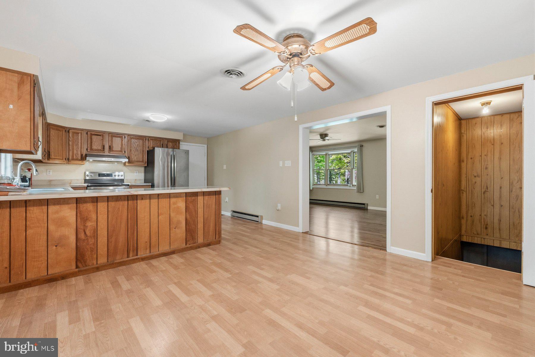 10820 Gambrill Park Road Frederick, MD 21702 - Photo 17 of 35 Spacious kitchen with warm wood accents.