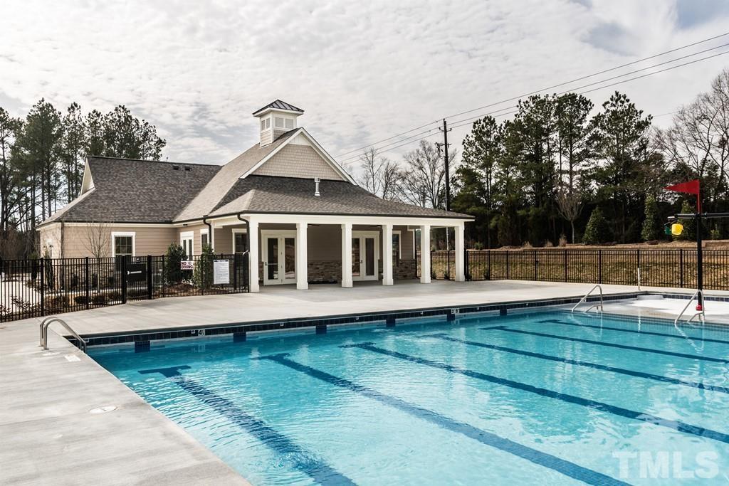 529 Ingram Ridge Court Knightdale, NC 27545 - Photo 5 of 6 a view of a house with pool and sitting area