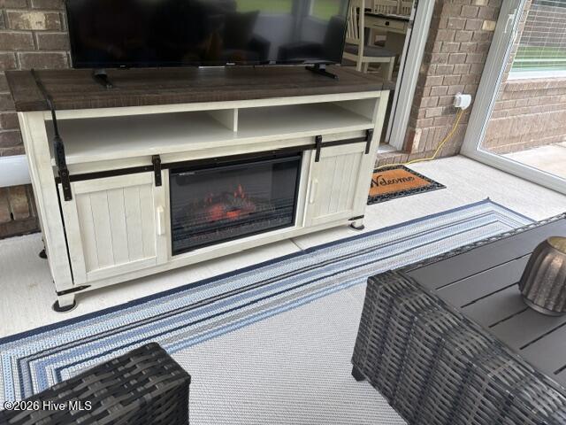 4005 Newby Road Rocky Mount, NC 27804 - Photo 8 of 32 console with electric fireplace is beautiful and functional- warm & cozy!