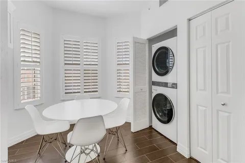 a view of a hallway with washer and dryer