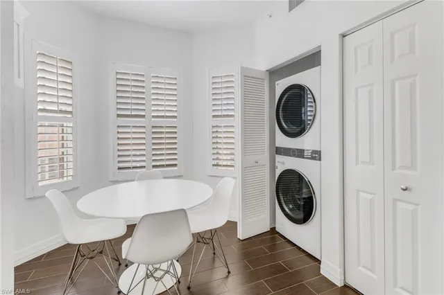 a view of a hallway with washer and dryer
