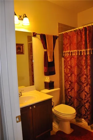 a bathroom with a sink and a toilet