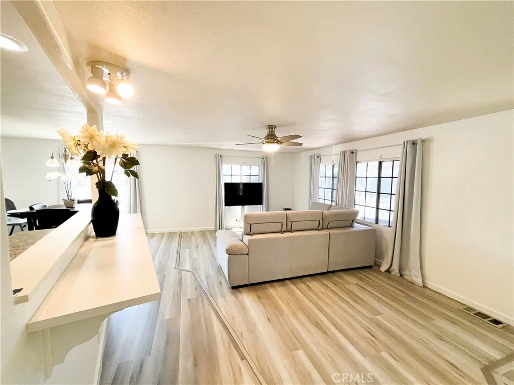 17700 Avalon, Unit 40 Carson, CA 90746 - Photo 12 of 32 a living room with furniture and a flat screen tv