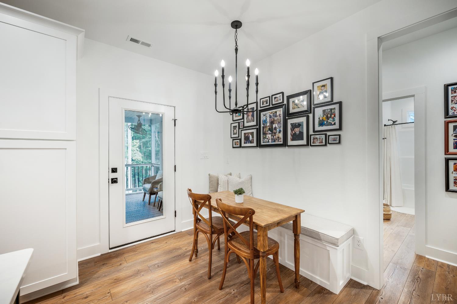 2262 Hooper Road Forest, VA 24551 - Photo 38 of 80 a view of a dining room with furniture window and wooden floor