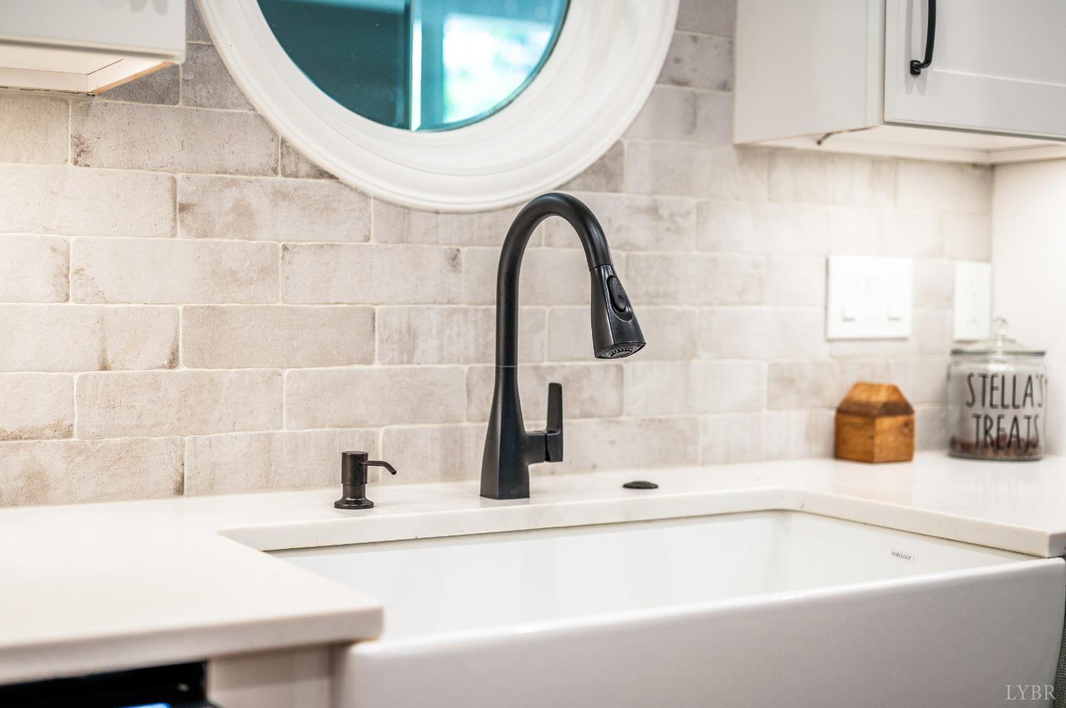 2262 Hooper Road Forest, VA 24551 - Photo 4 of 80 a bathroom with a sink and a mirror