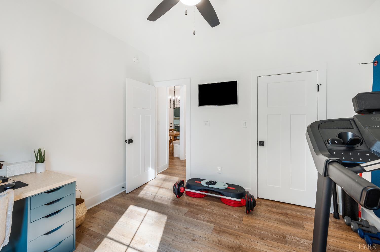 2262 Hooper Road Forest, VA 24551 - Photo 44 of 80 a living room with furniture and a wooden floor