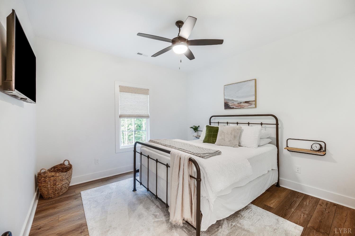 2262 Hooper Road Forest, VA 24551 - Photo 45 of 80 a bedroom with a bed and a tv