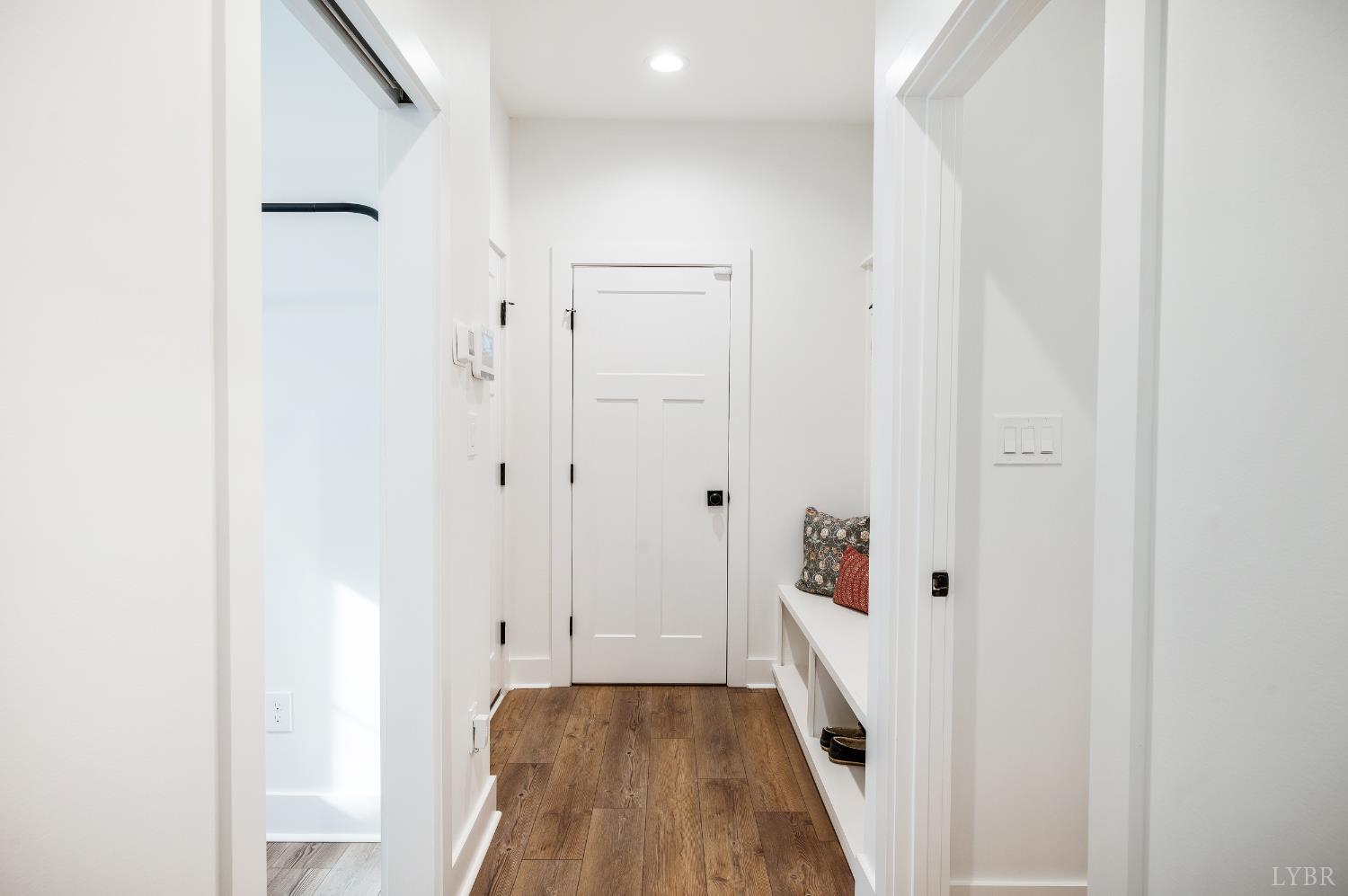 2262 Hooper Road Forest, VA 24551 - Photo 48 of 80 a view of a hallway with wooden floor and staircase