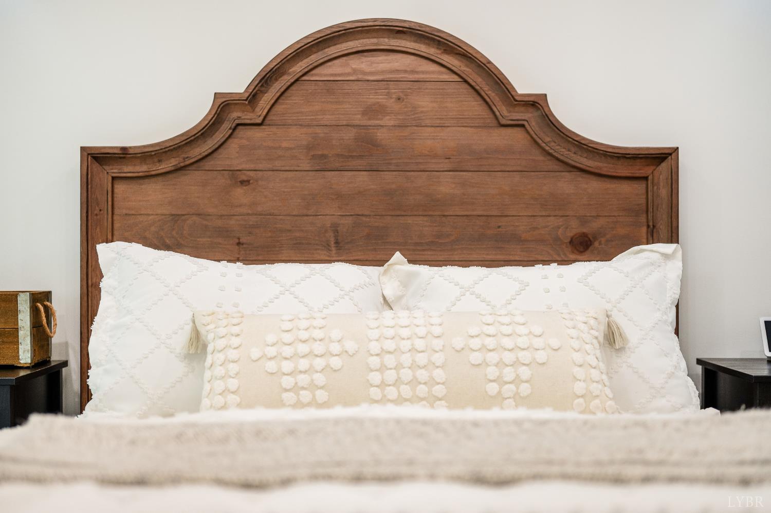 2262 Hooper Road Forest, VA 24551 - Photo 56 of 80 a wooden bench sitting in the middle of a yard