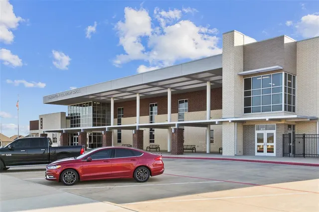 a car parked in front of a building