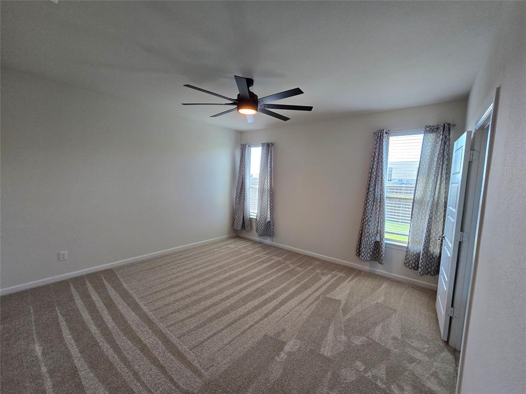 508 Williams Way Van Alstyne, TX 75495 - Photo 9 of 26 a view of an empty room with a window