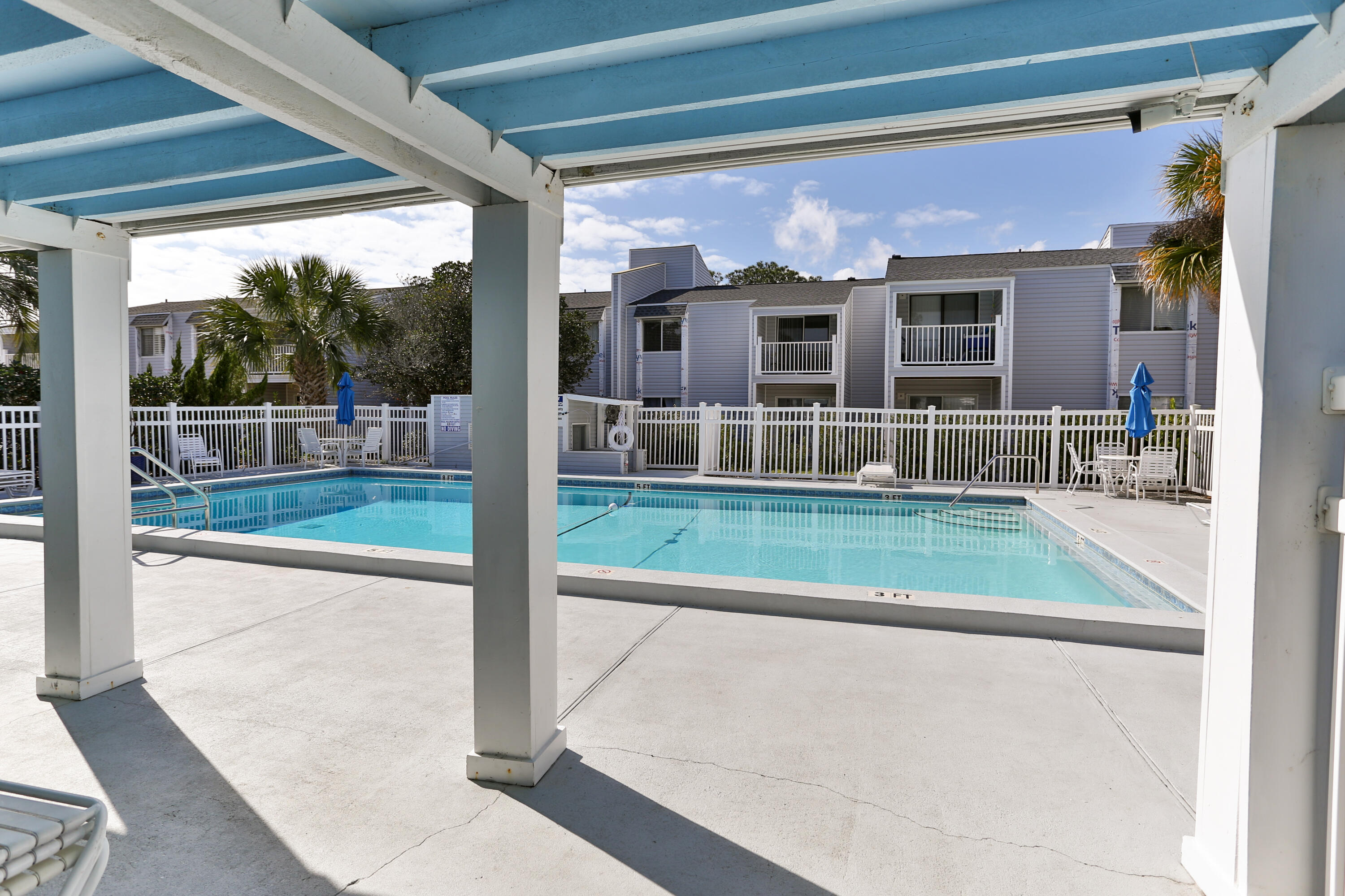 101 Old Ferry Road, Unit 1D Shalimar, FL 32579 - Photo 23 of 34 a view of backyard with porch