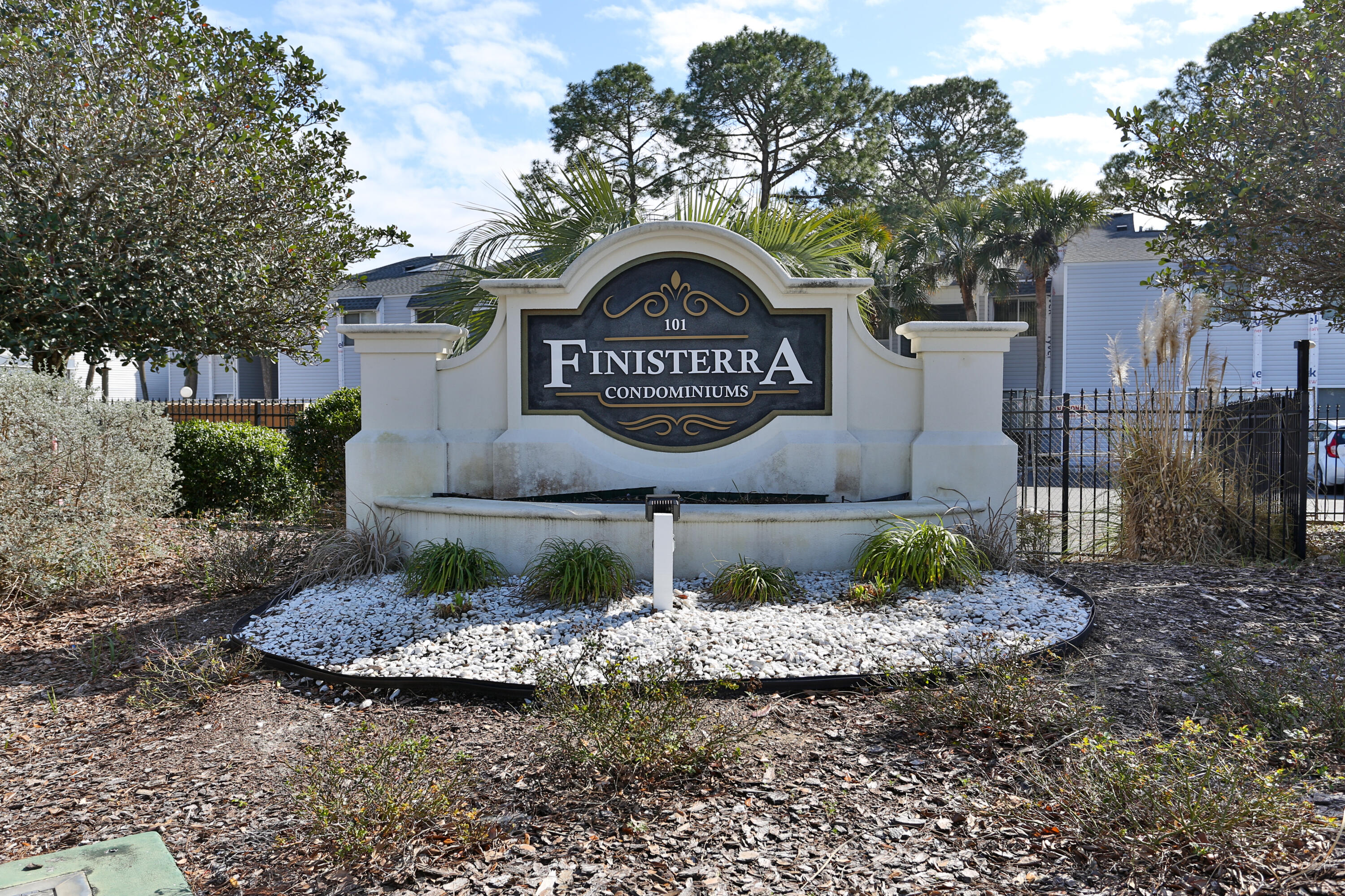101 Old Ferry Road, Unit 1D Shalimar, FL 32579 - Photo 27 of 34 a front view of a house with garden