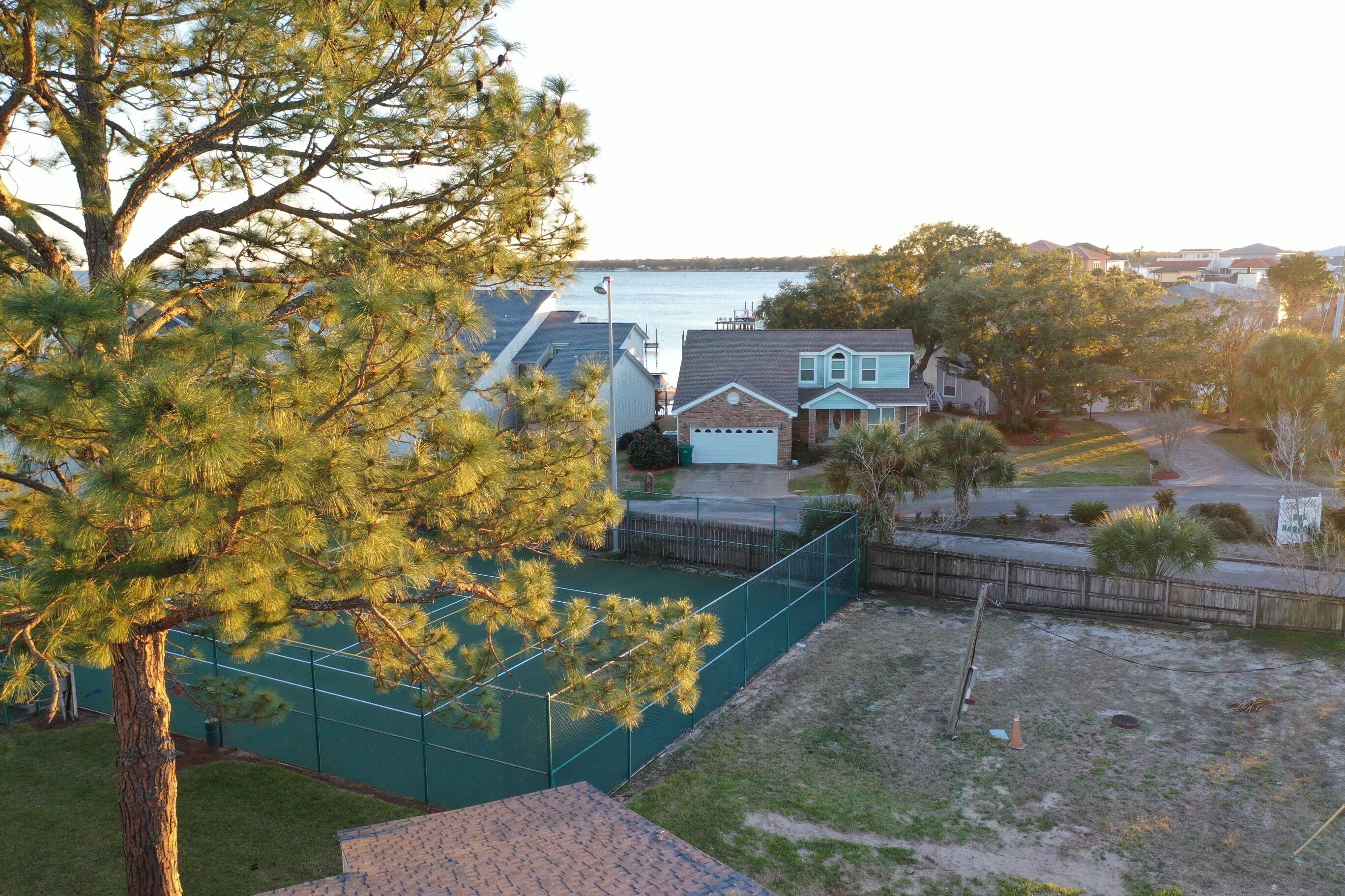 101 Old Ferry Road, Unit 1D Shalimar, FL 32579 - Photo 31 of 34 a view of a house with a yard