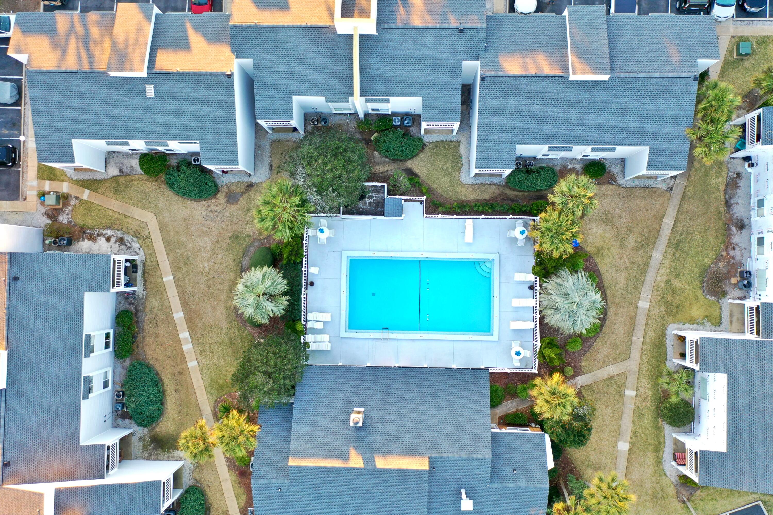 101 Old Ferry Road, Unit 1D Shalimar, FL 32579 - Photo 33 of 34 an aerial view of a house with a yard swimming pool and outdoor seating
