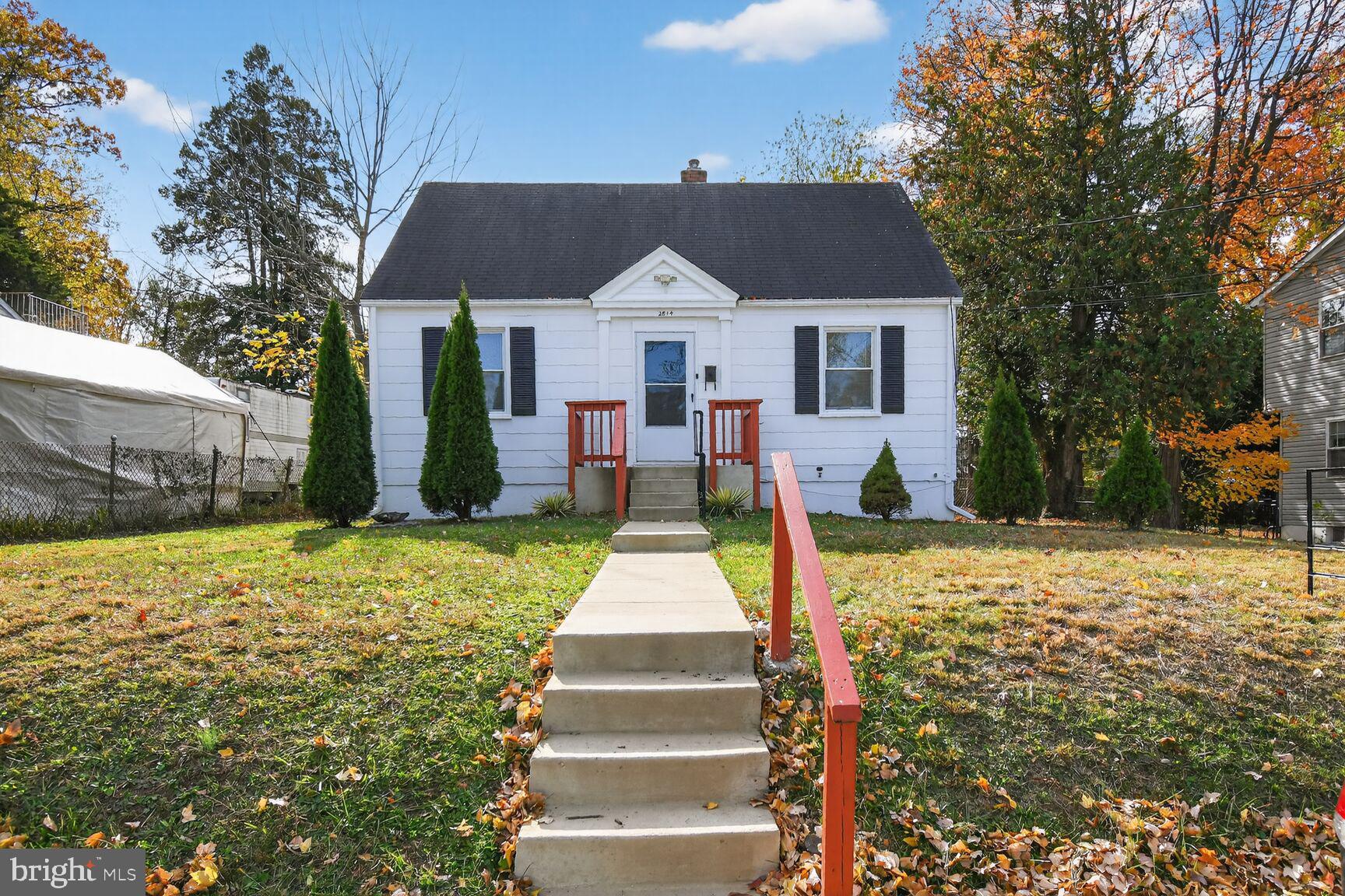 2814 Munson Street Silver Spring, MD 20902 - Photo 1 of 21 a front view of house with yard and trees
