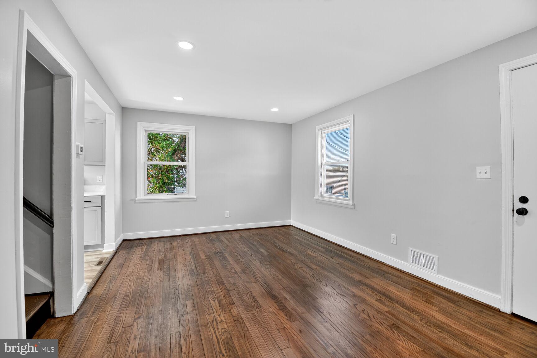 2814 Munson Street Silver Spring, MD 20902 - Photo 14 of 21 an empty room with wooden floor and windows