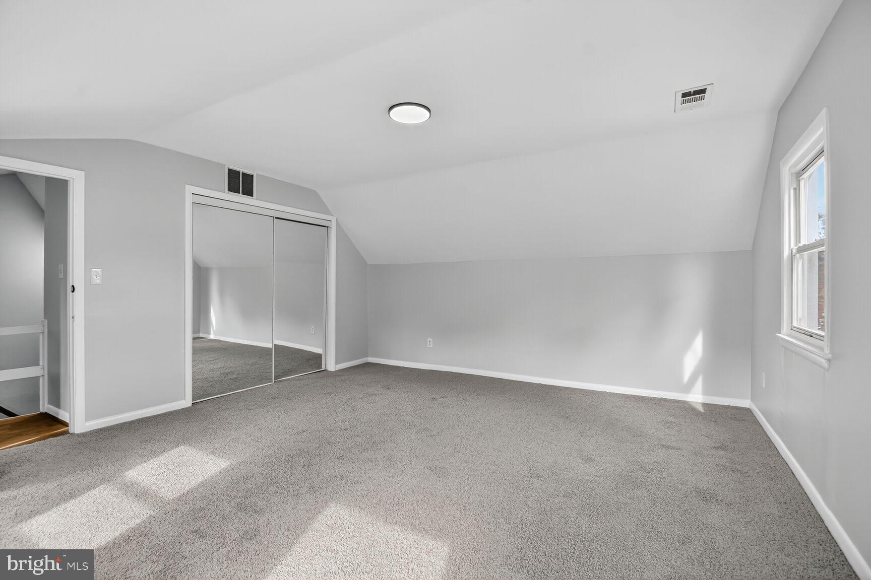 2814 Munson Street Silver Spring, MD 20902 - Photo 15 of 21 an empty room with windows and closet