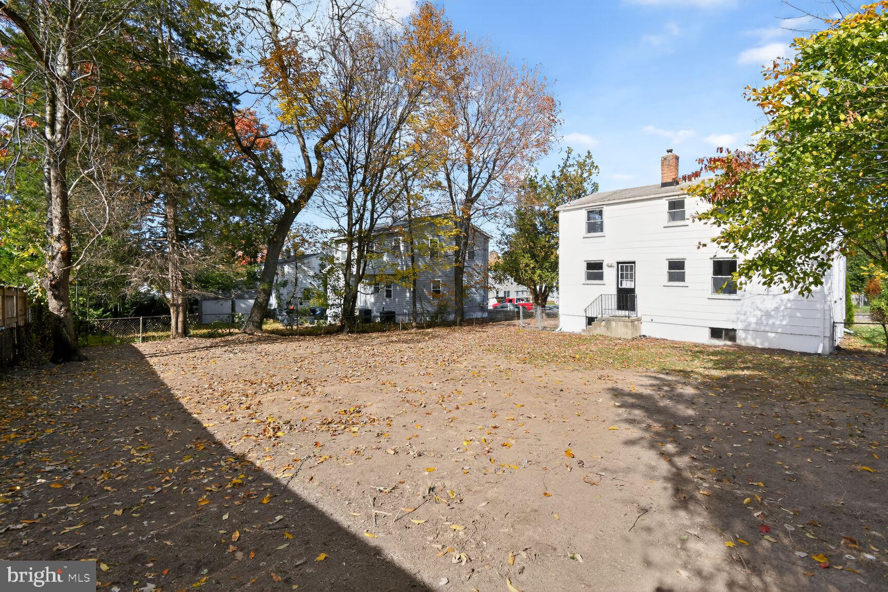 2814 Munson Street Silver Spring, MD 20902 - Photo 21 of 21 a view of road with large trees