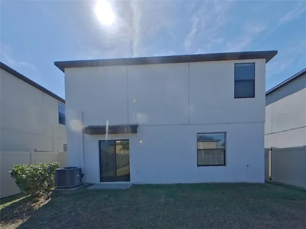 a room with window and furniture