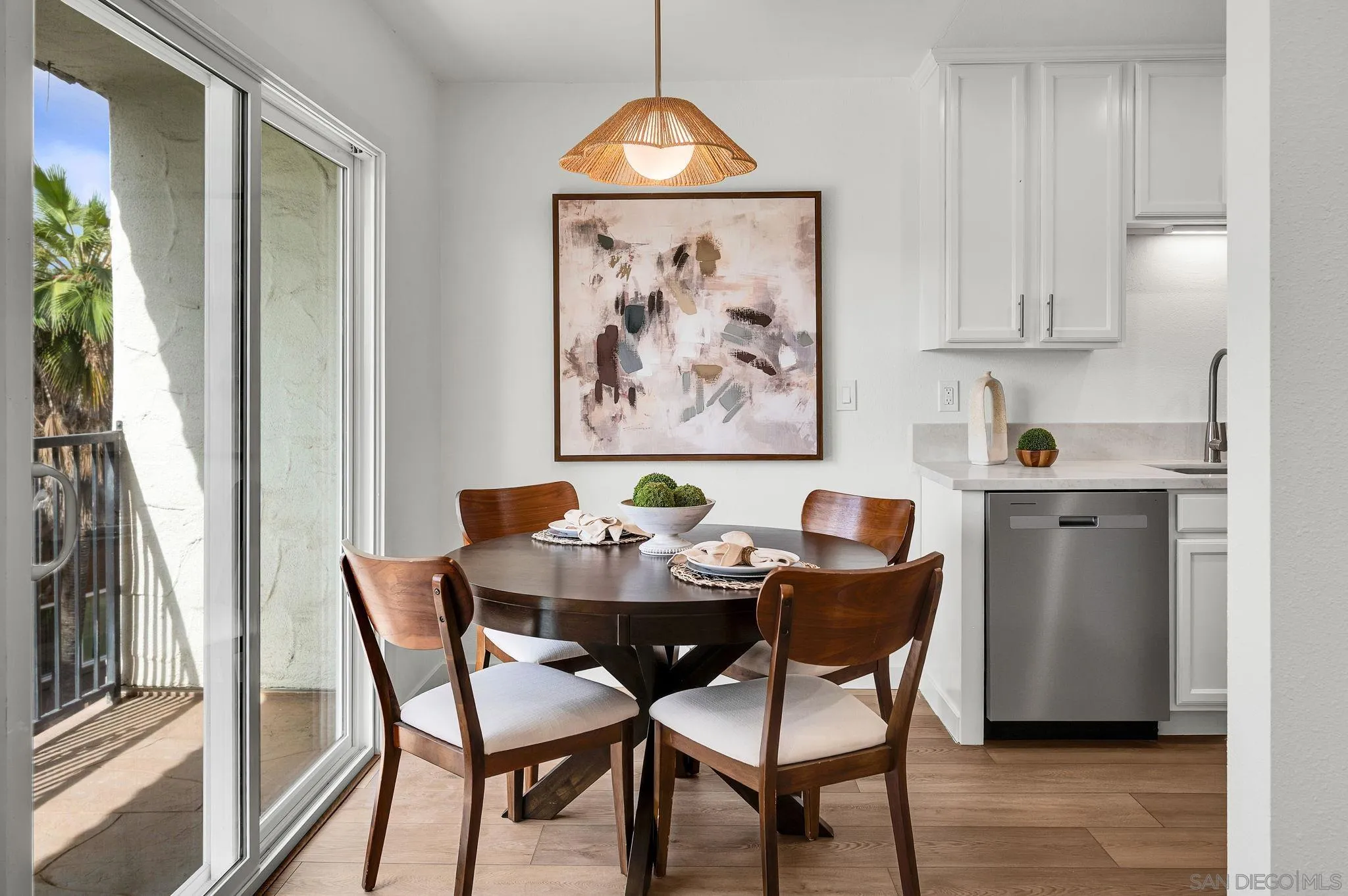 10235 Madrid Way, Unit 108 Spring Valley, CA 91977 - Photo 7 of 22 a dining room with furniture and window