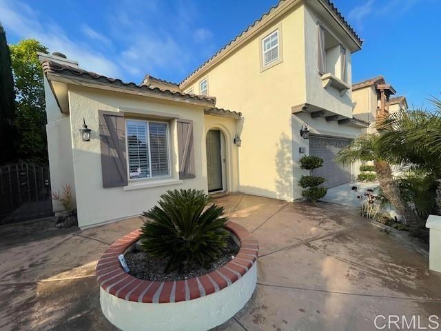 2207 Corte Anacapa Chula Vista, CA 91914 - Photo 2 of 22 a view of a house with a patio