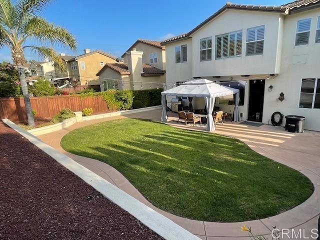 2207 Corte Anacapa Chula Vista, CA 91914 - Photo 22 of 22 a view of a house with sitting area and furniture