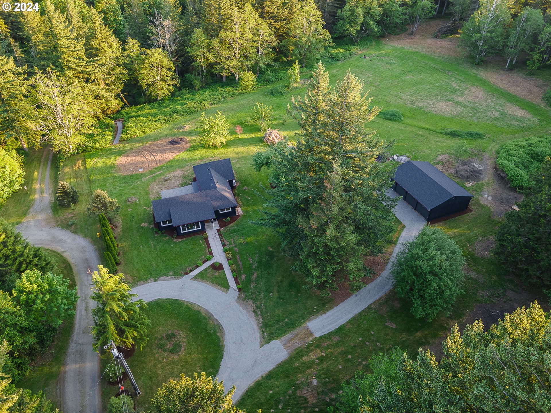 501 Northeast Rohrbach Road Corbett, OR 97019 - Photo 26 of 31 a view of a garden with plants